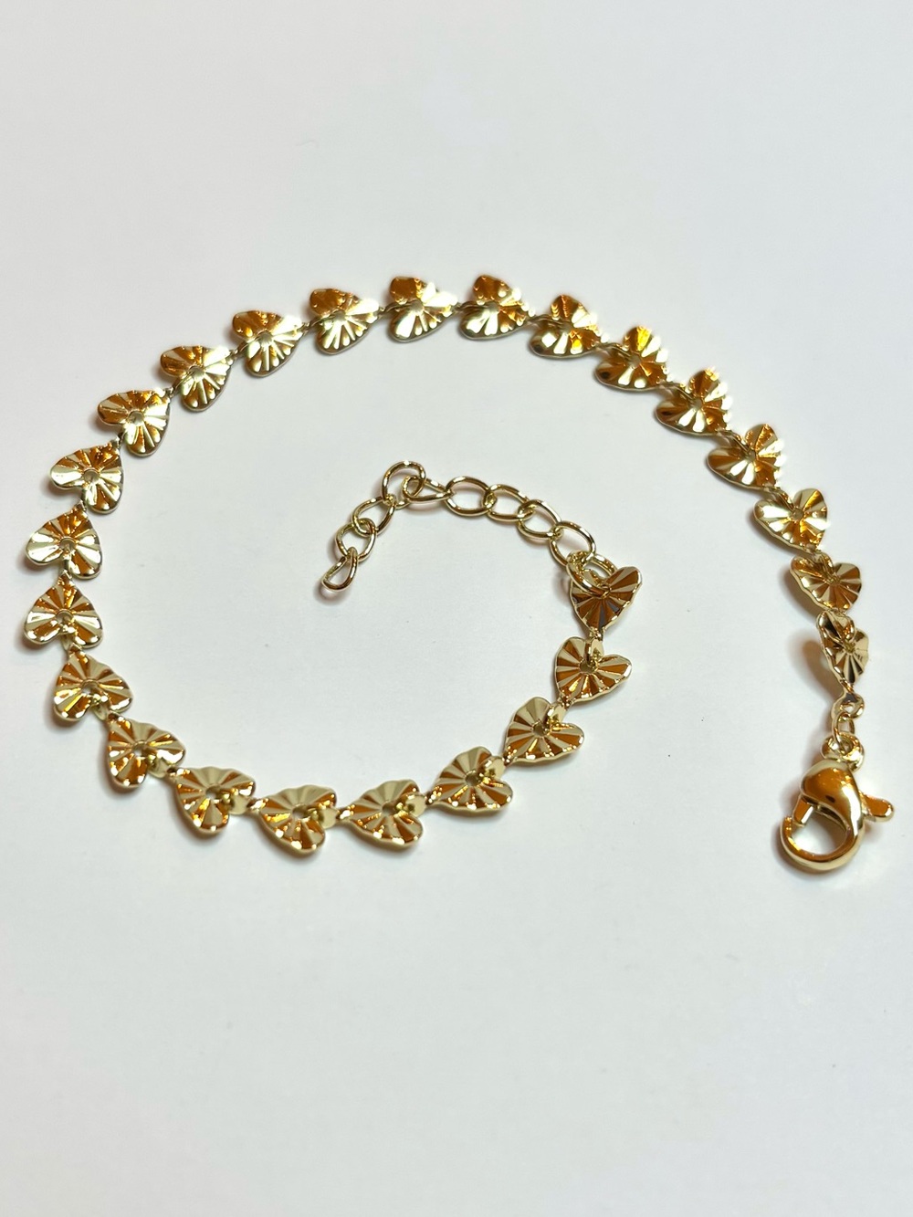 Gold diamond cut heart bracelet